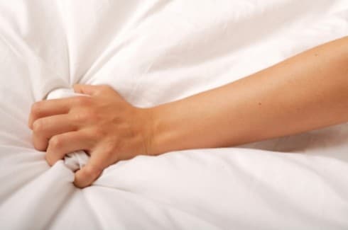 7 Things Happy Couples Practice - Re Providence life coaching and Reiki counseling - womans_hand_during_orgasm-490x325